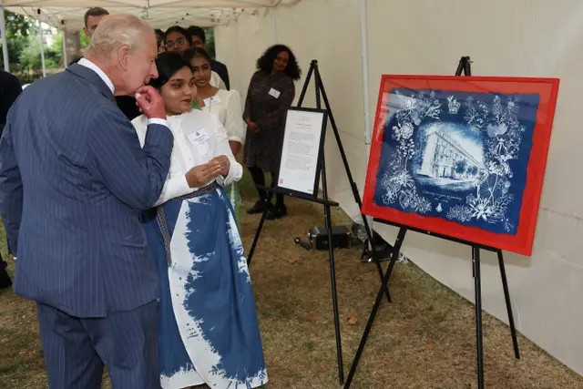 Ruwanthi Gajadeera presents her cyanotype artwork to King Charles III at the Victoria League’s 125th anniversary garden party in London